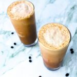 2 tall glasses of homemade iced cappuccino.