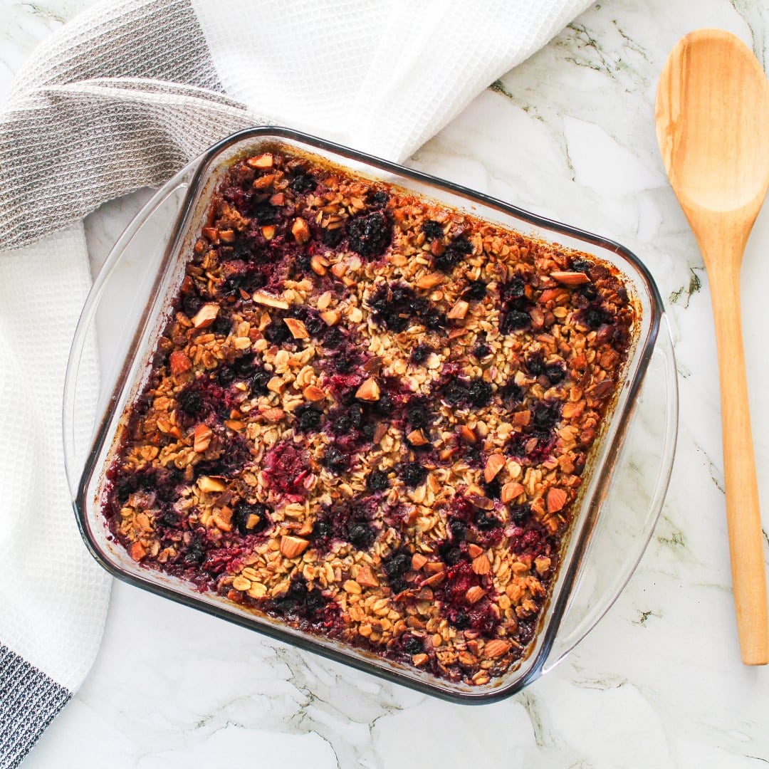 Baked oatmeal with berries, in a baking dish.