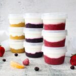 6 cups of yogurt with fruit compote on the bottom, in 3 different flavors.