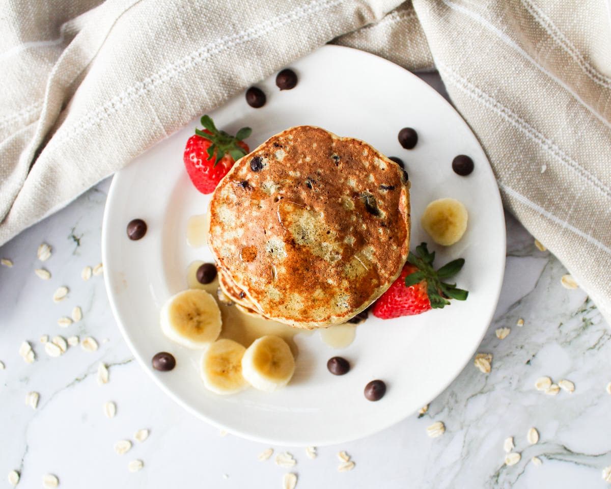 Chocolate chip pancakes on a plate.